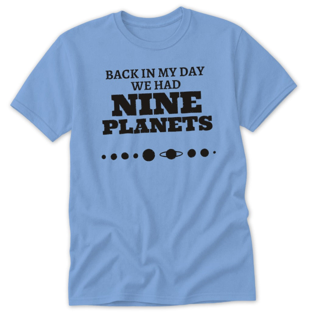 Light blue t-shirt with "Back in my day we had NINE PLANETS" and planet graphic.
