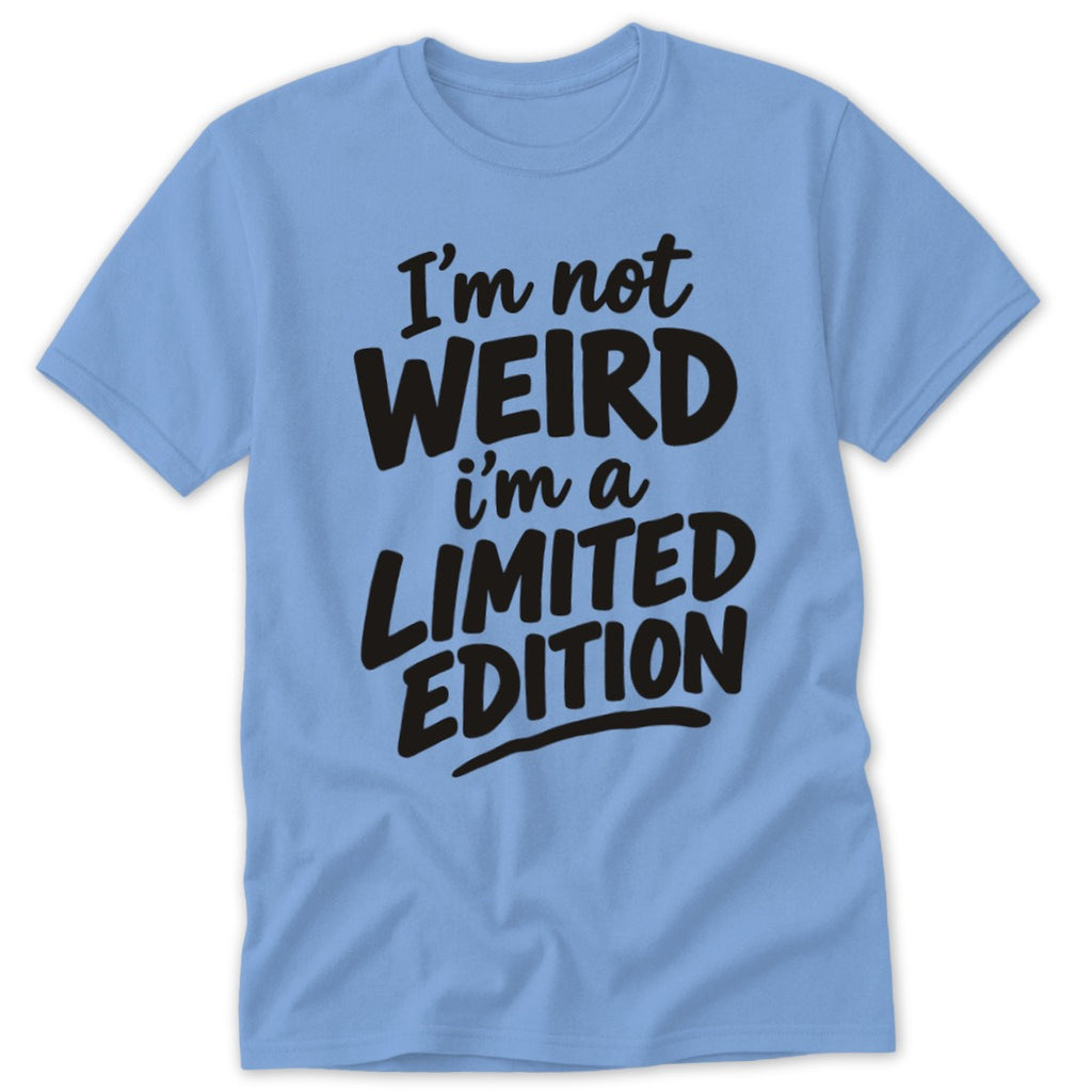 A light blue short-sleeved t-shirt features black text that reads, I'm not WEIRD i'm a LIMITED EDITION.