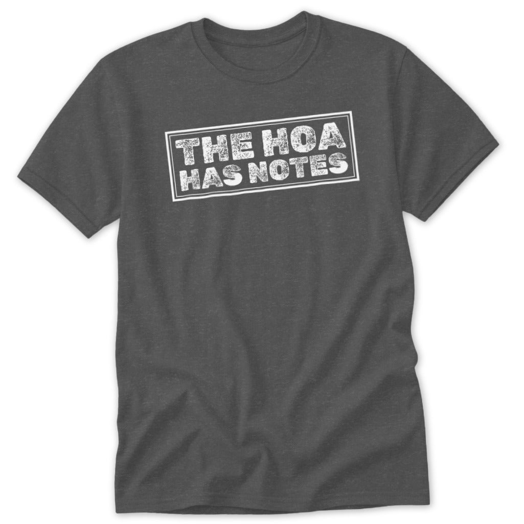 Dark grey t-shirt with white distressed text "THE HOA HAS NOTES" inside a rectangle.