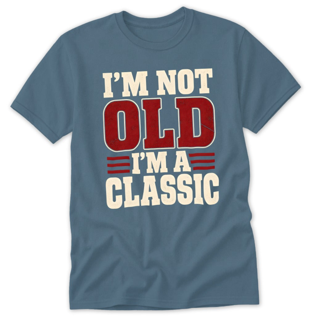 A blue short-sleeved t-shirt with the text I'M NOT OLD I'M A CLASSIC printed on the front.