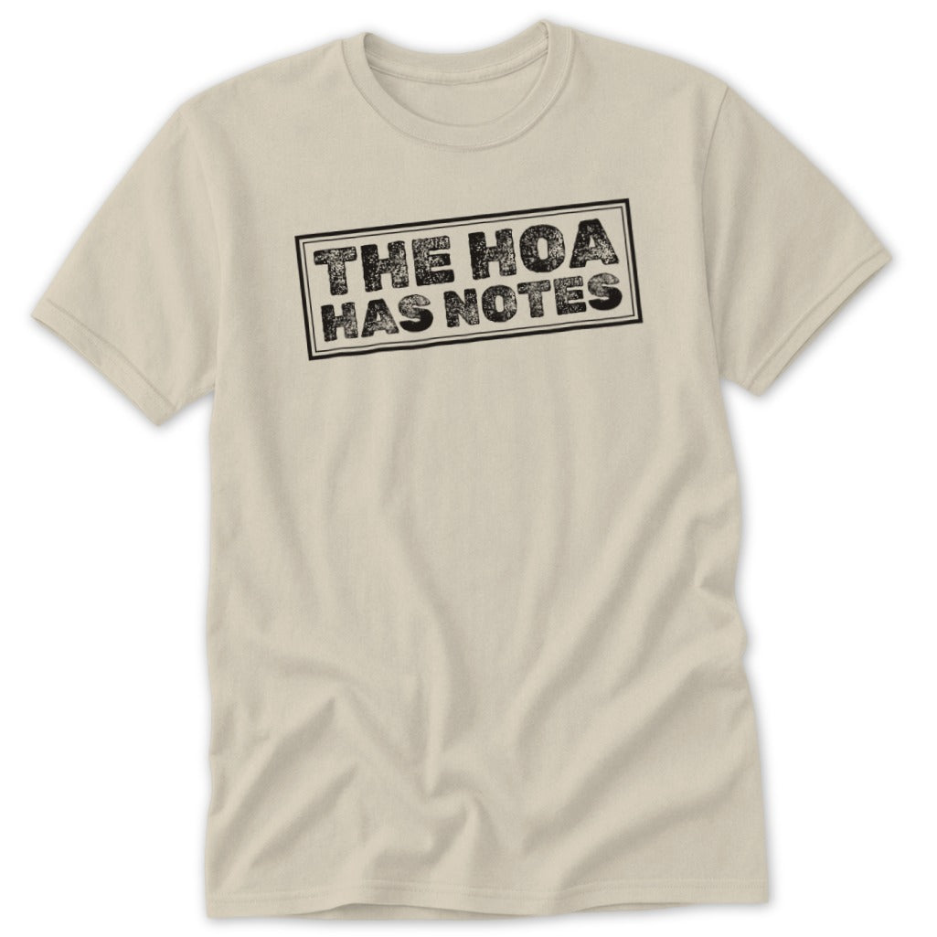 Cream t-shirt with black text that says "THE HOA HAS NOTES" in a rectangle.