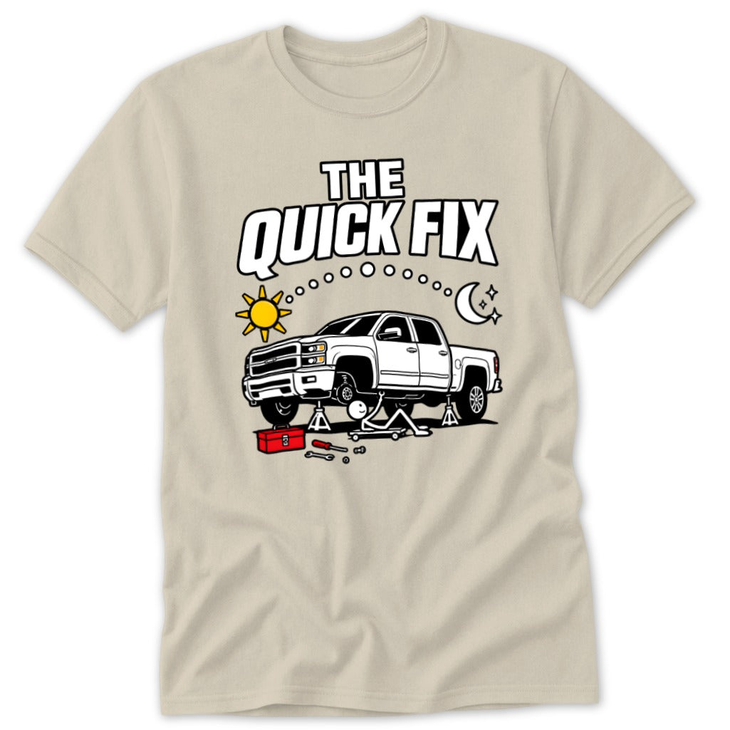 T-shirt graphic: "The Quick Fix" text over white pickup truck on jacks