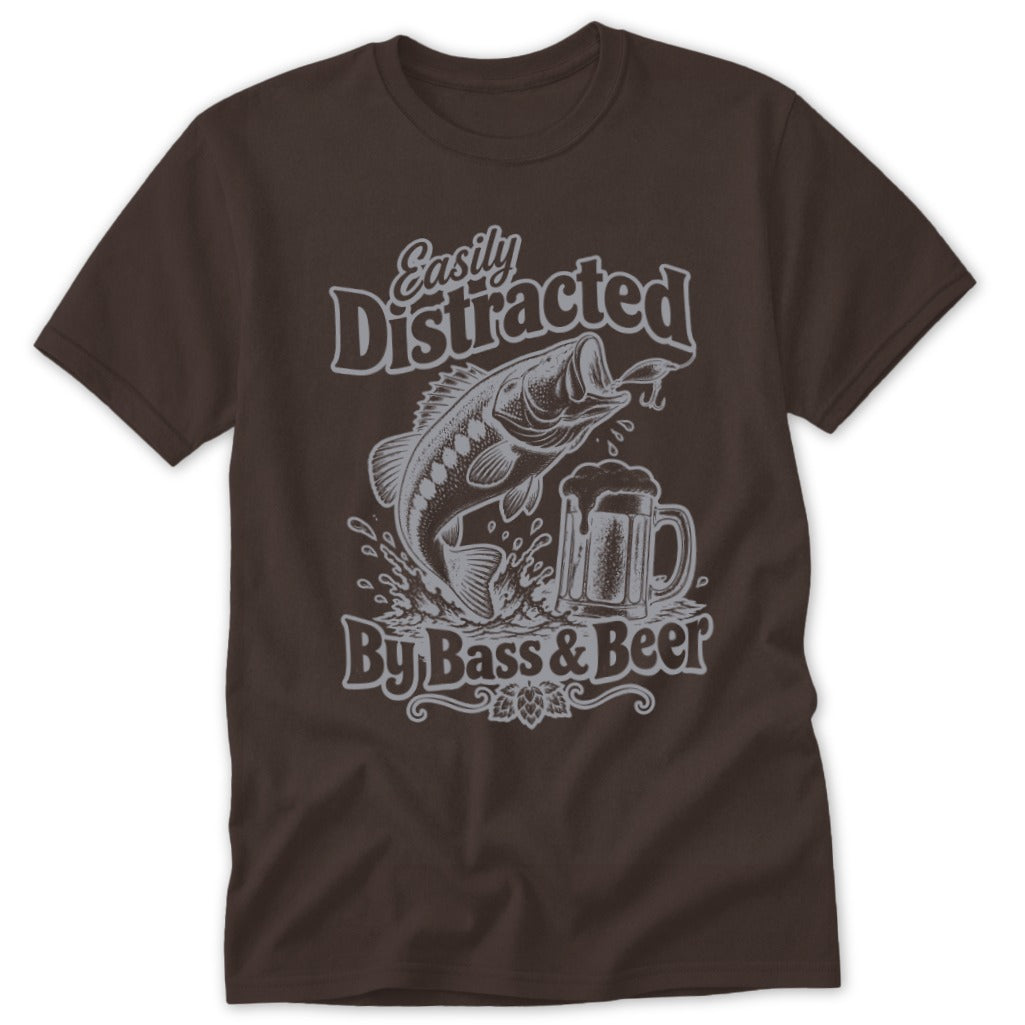 A dark brown t-shirt featuring a gray graphic of a jumping fish, a beer mug, and the text "Easily Distracted By Bass & Beer".