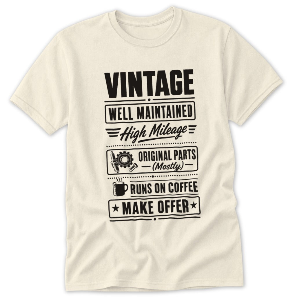 Vintage shirt with text: well maintained, high mileage, original parts, runs on coffee, make offer.