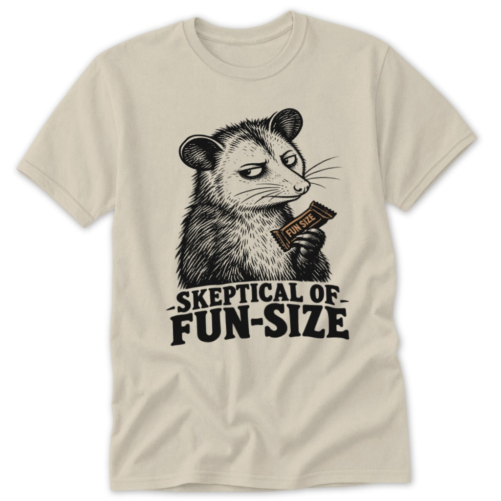 Opossum holding a fun size candy bar, skeptical of fun-size text.
