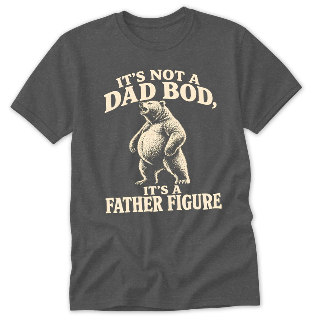A dark grey t-shirt featuring a beige graphic of a standing bear with text that reads It's not a dad bod, it's a father figure.