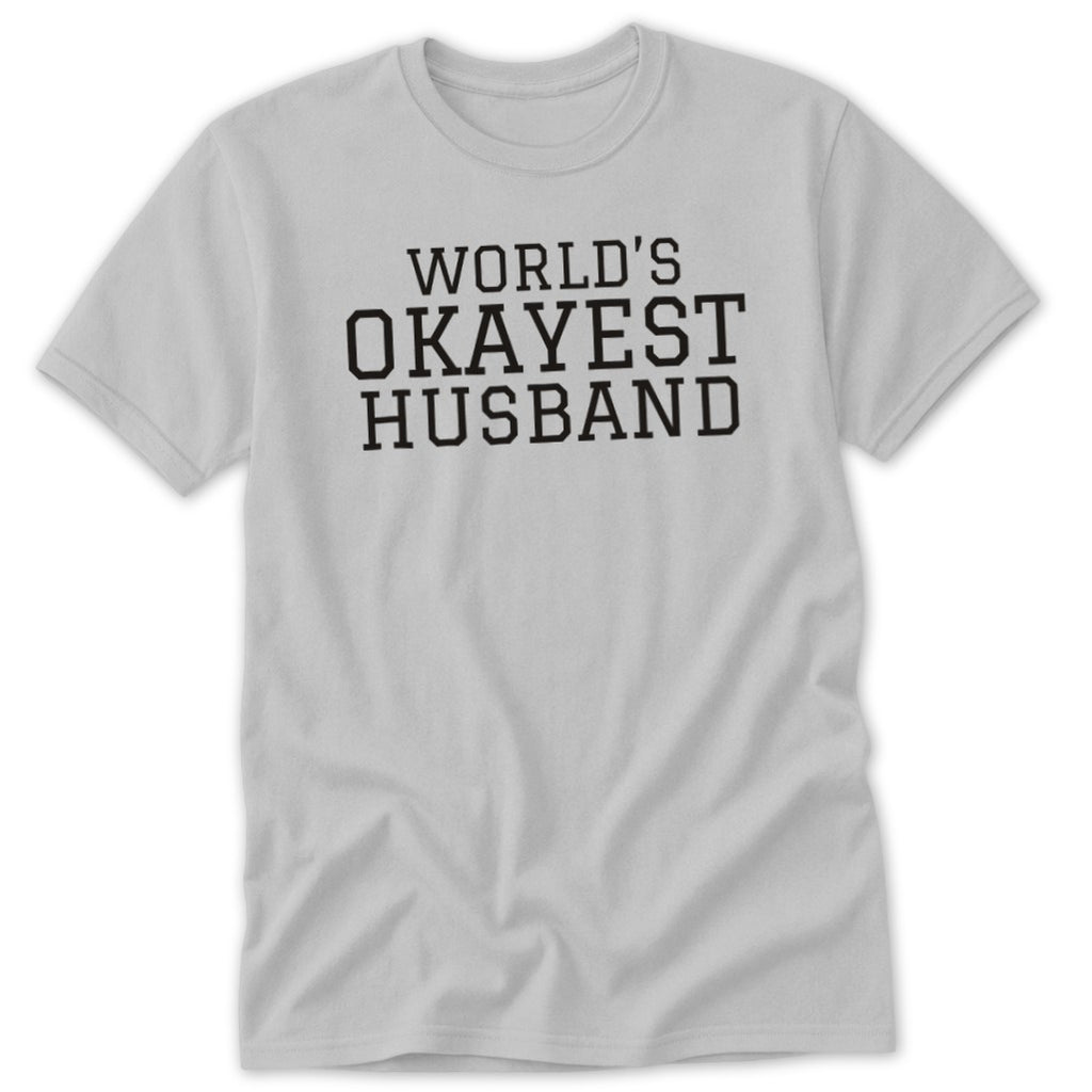 Light grey t-shirt with black text reading "WORLD'S OKAYEST HUSBAND".