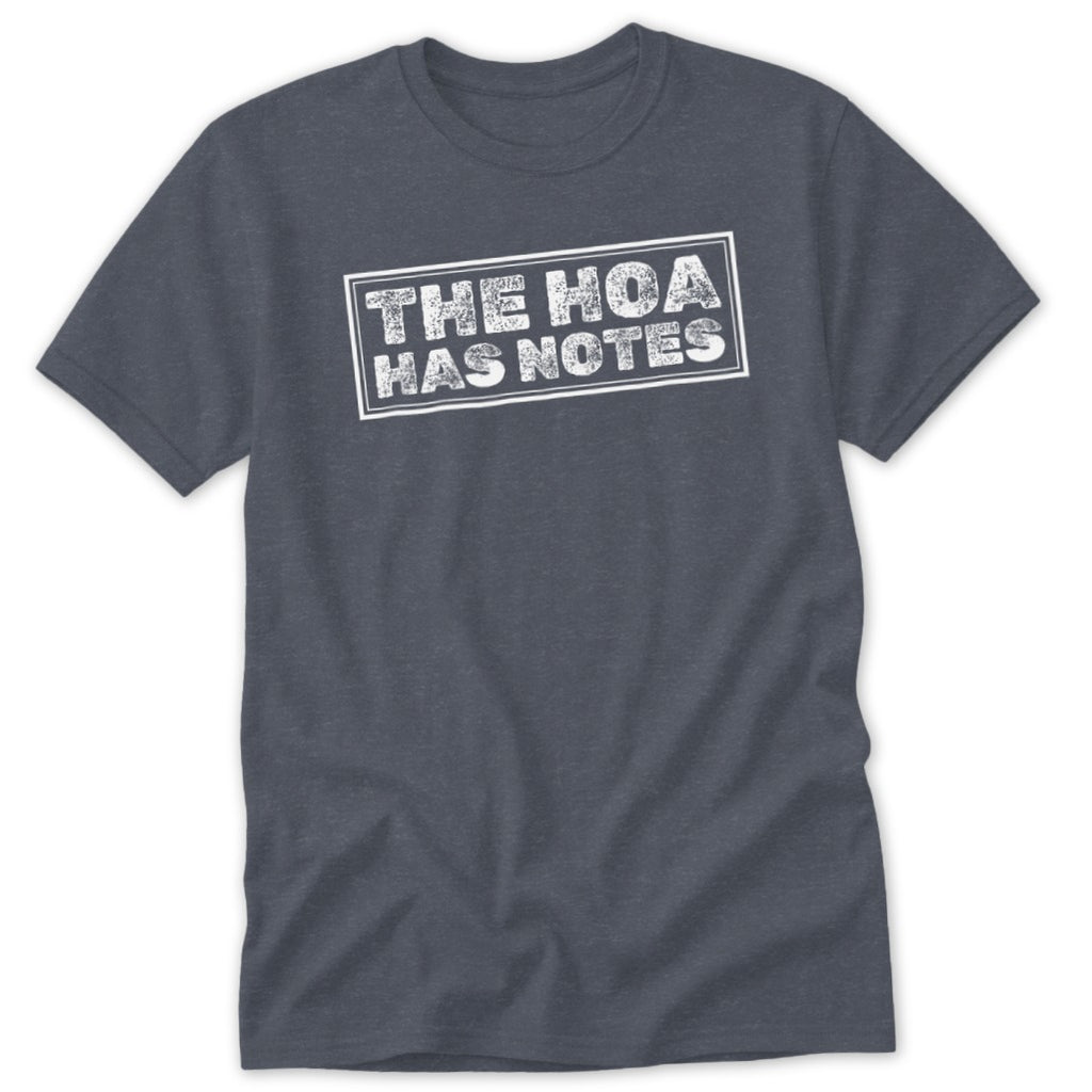 Dark grey t-shirt with white distressed text reading "THE HOA HAS NOTES".
