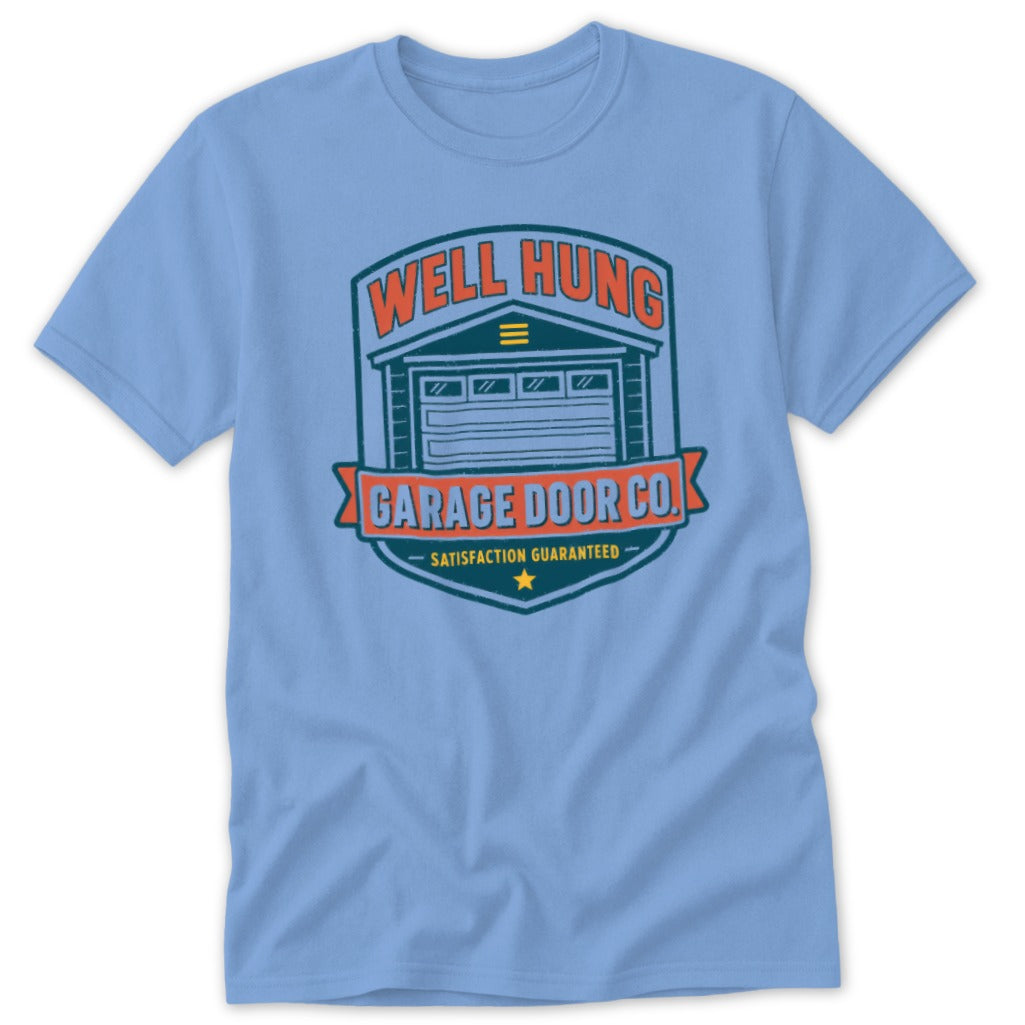 Light blue t-shirt with "Well Hung Garage Door Co." graphic and a star.