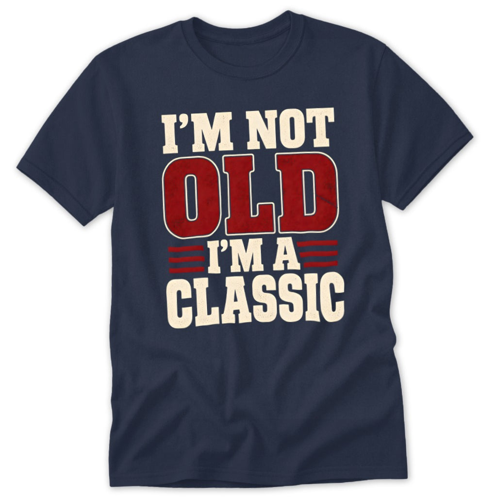 A navy blue t-shirt printed with the text "I'm Not Old I'm a Classic" in white and red.