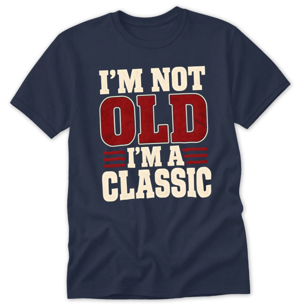 A navy blue t-shirt printed with the text "I'm Not Old I'm a Classic" in white and red.
