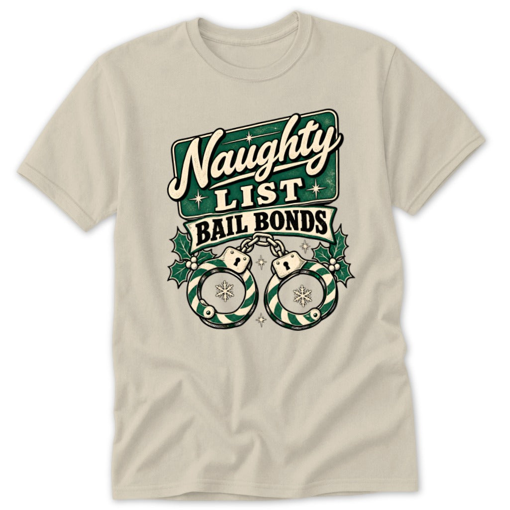 Naughty List Bail Bonds text with handcuffs and holly on a tan t-shirt.