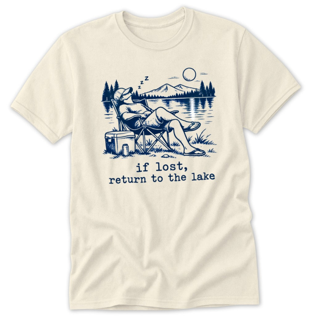 T-shirt with illustration of man sleeping in a chair by a lake, text "if lost, return to the lake".