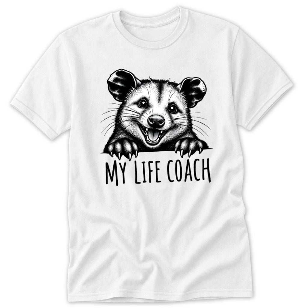 T-shirt with black and white drawing of a smiling opossum above the text "MY LIFE COACH".