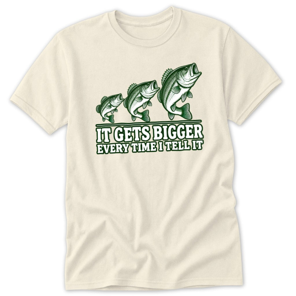 Cream t-shirt with three fish increasing in size and text "IT GETS BIGGER EVERY TIME I TELL IT".