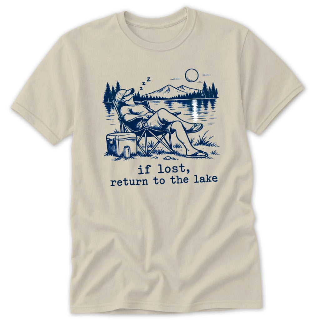 Man sleeping in a chair by a lake with text "if lost, return to the lake".