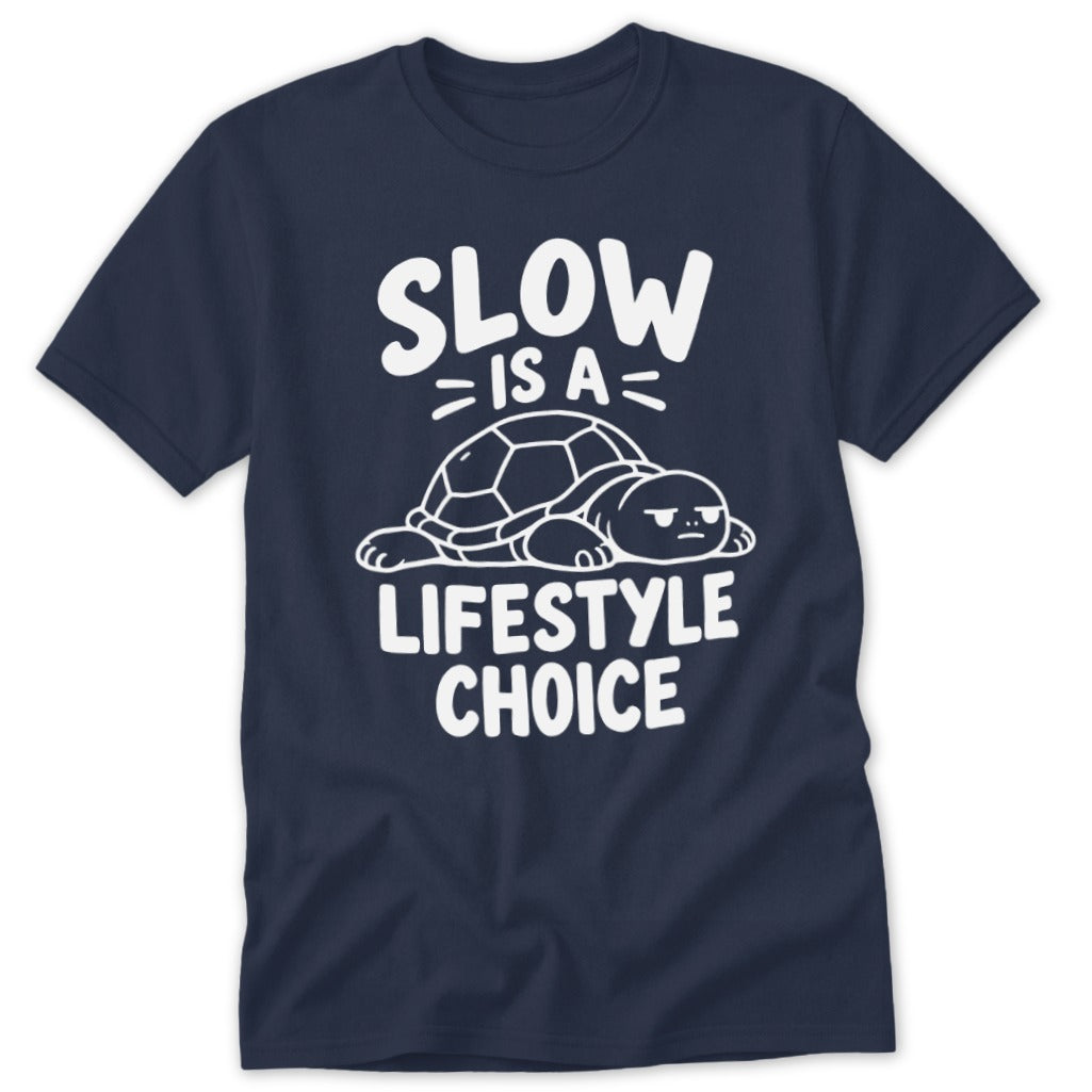 Dark blue short-sleeved t-shirt featuring a white graphic of a turtle and text reading Slow is a lifestyle choice.