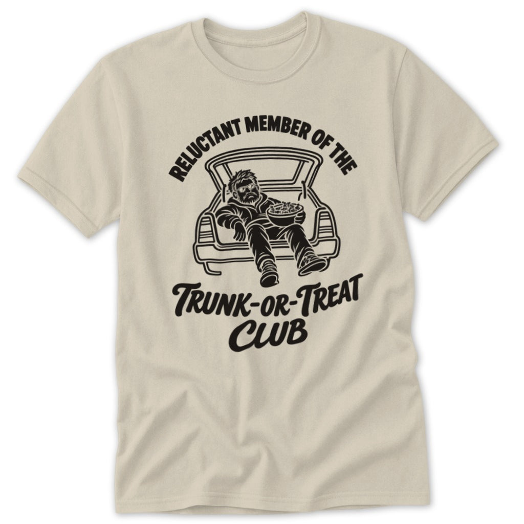 Shirt with black graphic of man in trunk holding bowl, text "Reluctant Member of the Trunk-or-Treat Club".