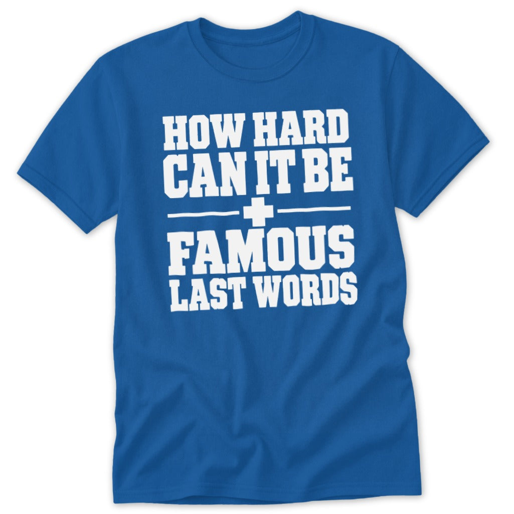 Royal blue short-sleeve crewneck t-shirt featuring the white text "HOW HARD CAN IT BE + FAMOUS LAST WORDS".