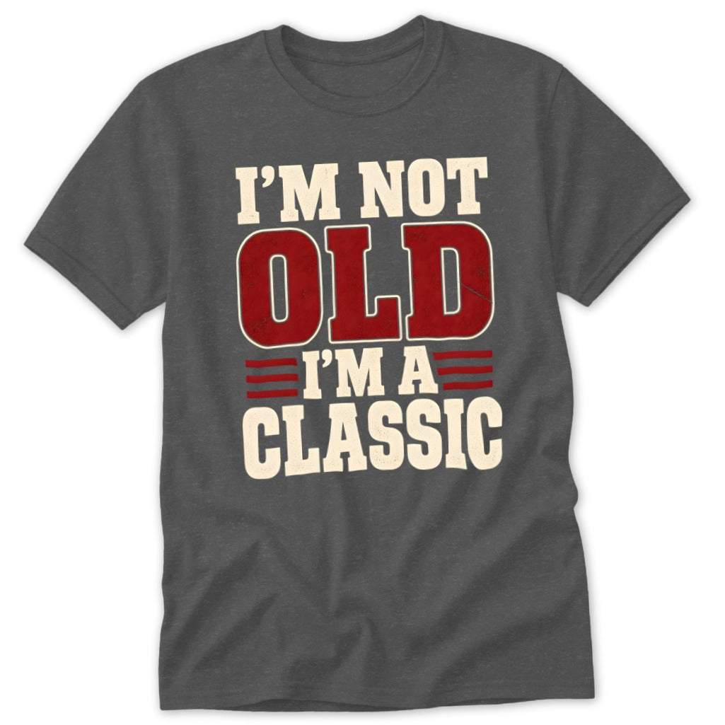 Dark gray crewneck t-shirt featuring the distressed red and white text I'M NOT OLD I'M A CLASSIC across the chest.