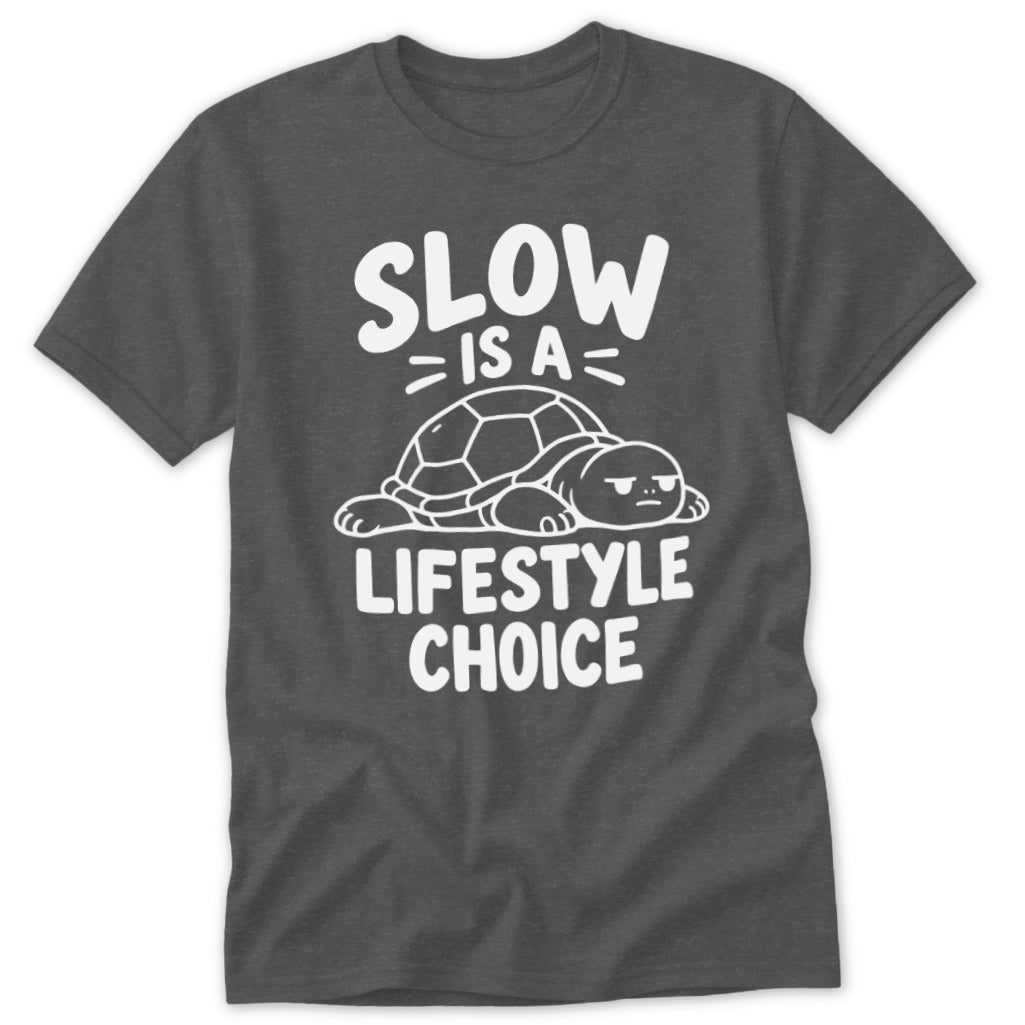 A dark gray t-shirt with white text that reads SLOW IS A LIFESTYLE CHOICE above a resting turtle.
