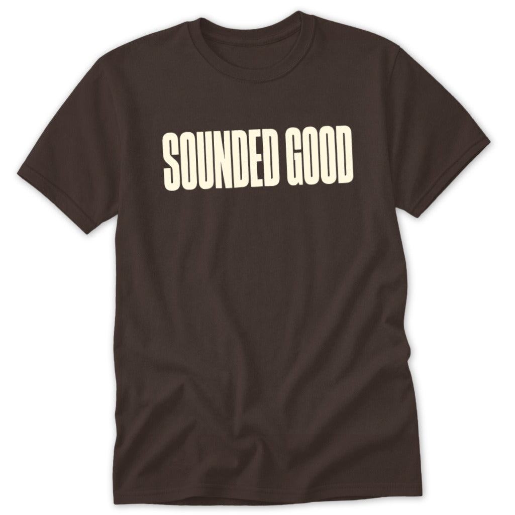 Brown t-shirt with "SOUNDED GOOD" printed in off-white block letters.