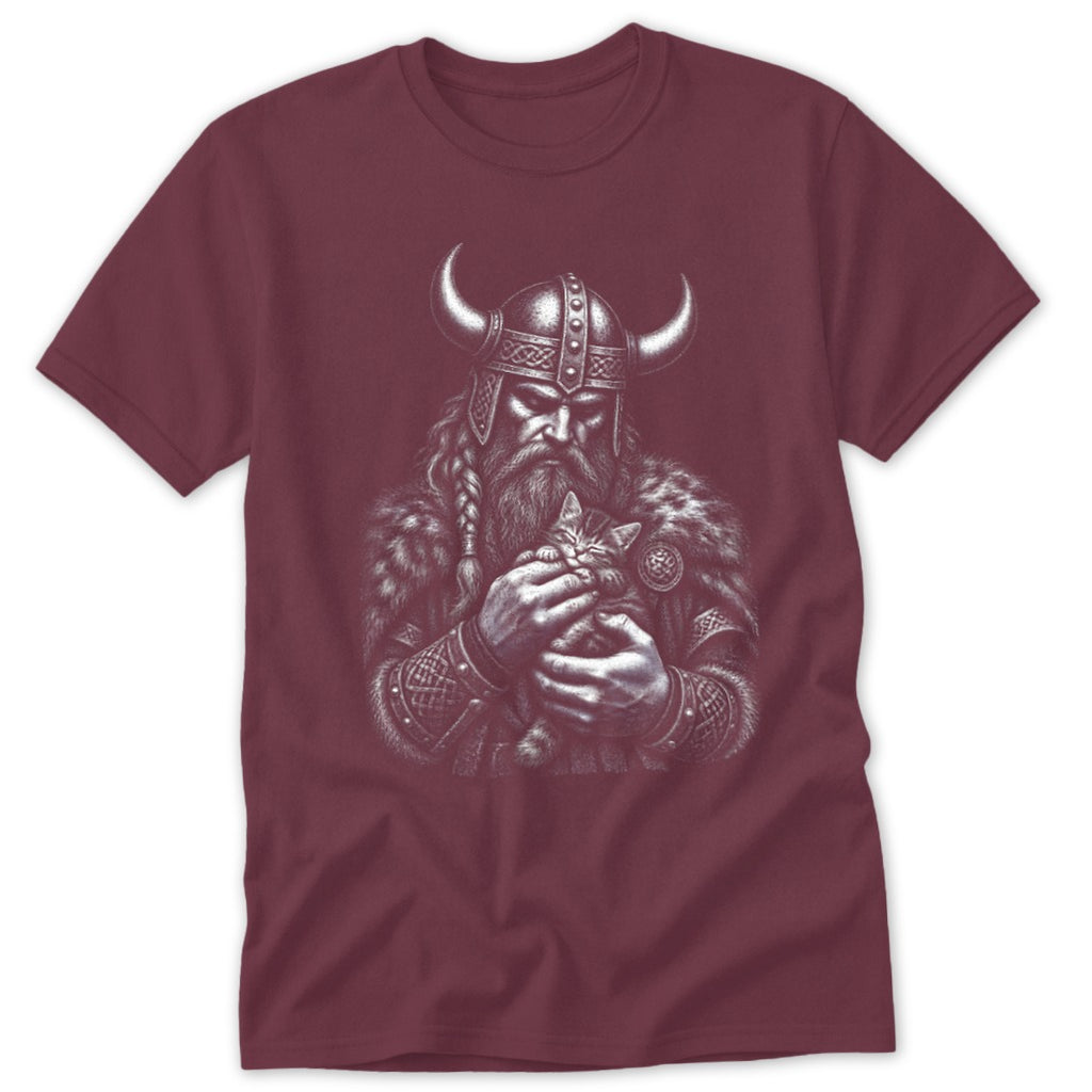 A maroon crewneck t-shirt featuring a detailed white graphic of a horned Viking holding a small kitten.