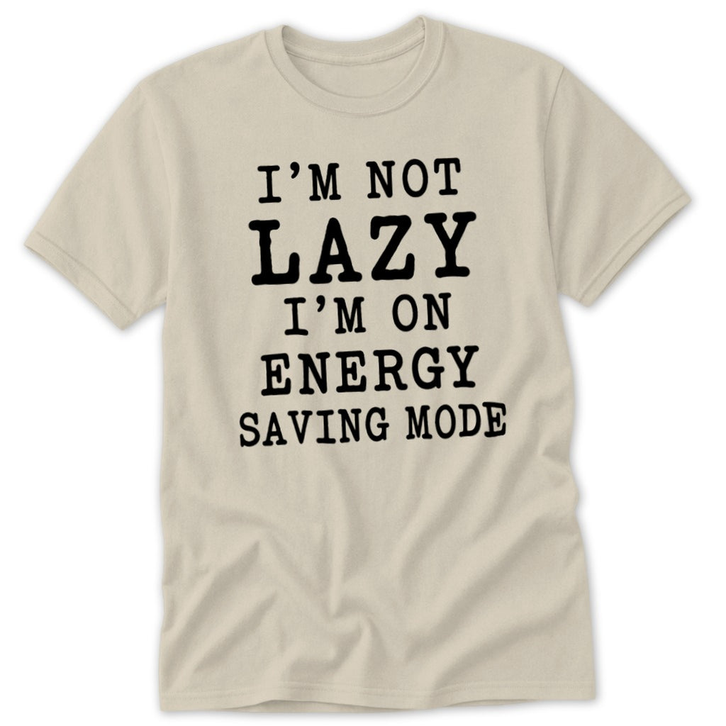 Cream t-shirt with black text reading "I'M NOT LAZY I'M ON ENERGY SAVING MODE".