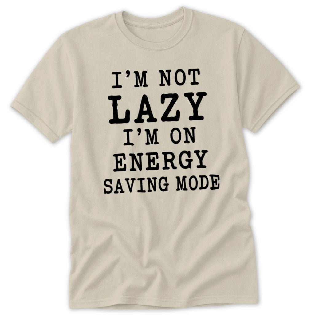 Cream t-shirt with black text reading "I'M NOT LAZY I'M ON ENERGY SAVING MODE".