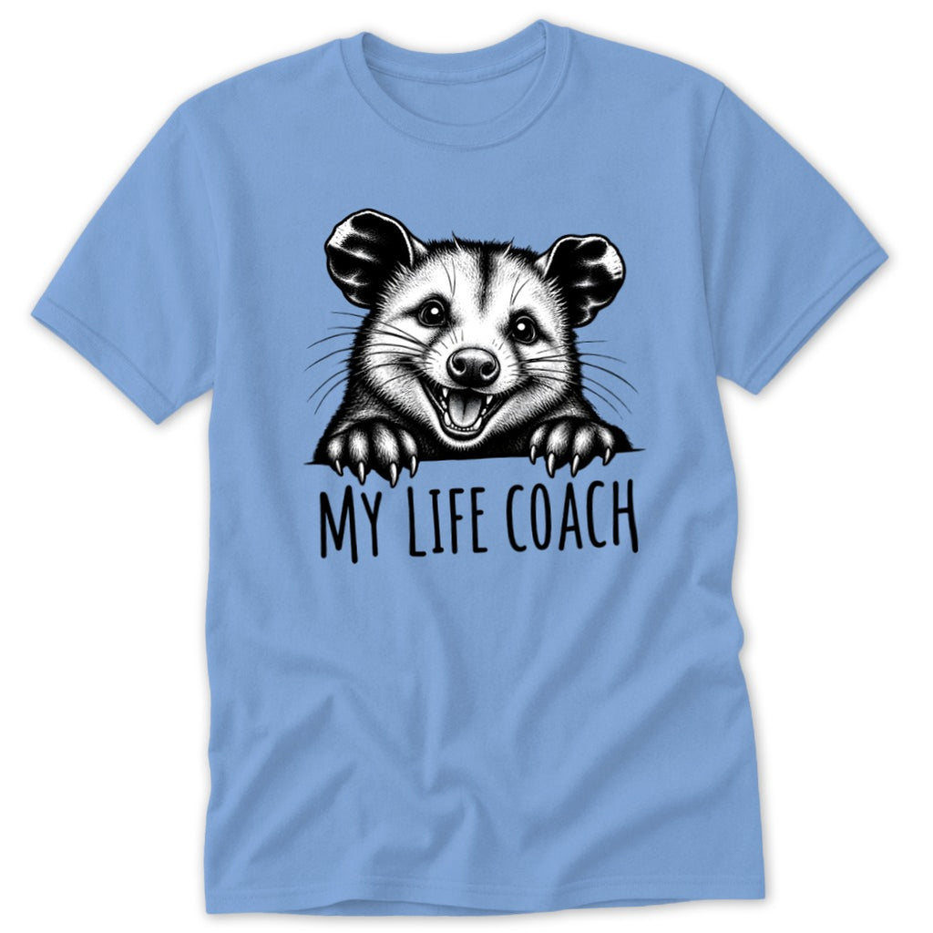 T-shirt with black and white drawing of a smiling possum peeking over text.