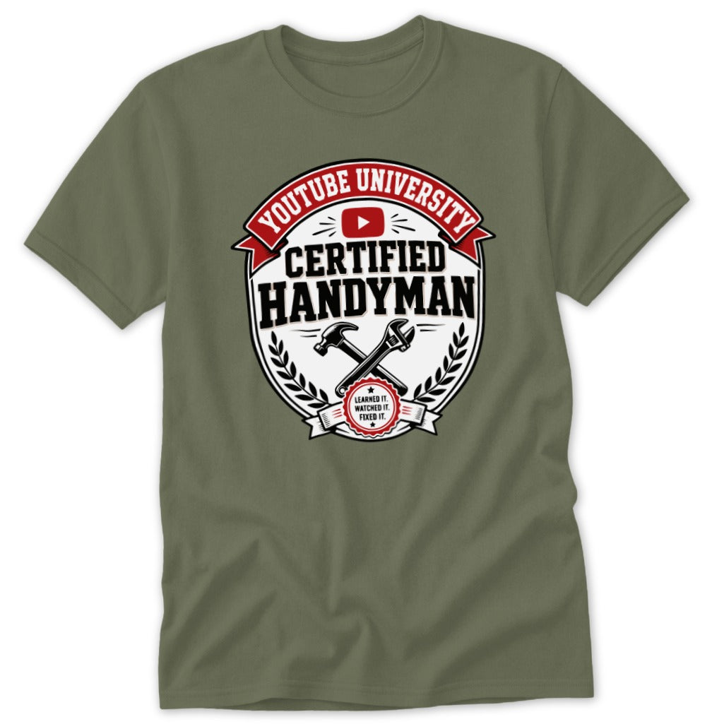 An olive green t-shirt featuring a graphic design with crossed tools and text reading YouTube University Certified Handyman.