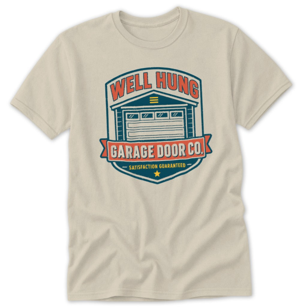 Well Hung Garage Door Co. satisfaction guaranteed logo on a light cream t-shirt.