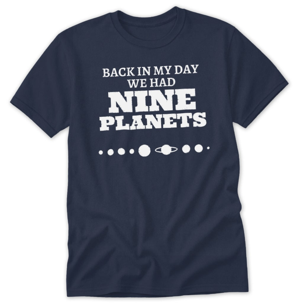 Dark blue t-shirt with "Back in my day we had nine planets" text and planet graphics.