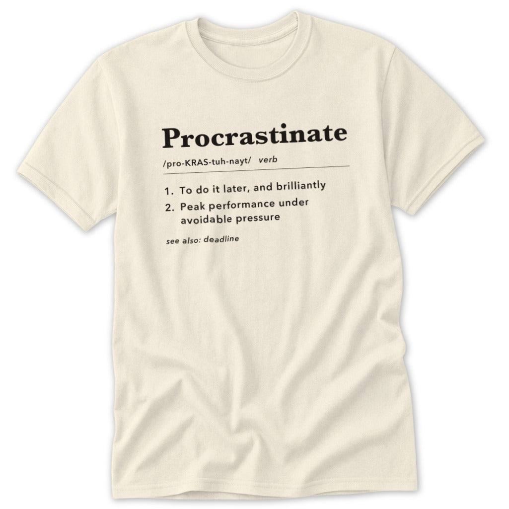 Cream t-shirt with "Procrastinate" definition printed in black text.