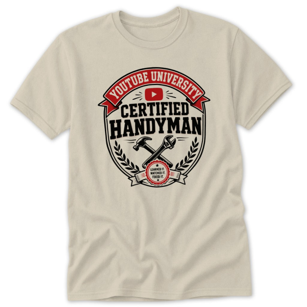 A cream-colored t-shirt with a graphic on the chest reading "Youtube University Certified Handyman" surrounding crossed tools.
