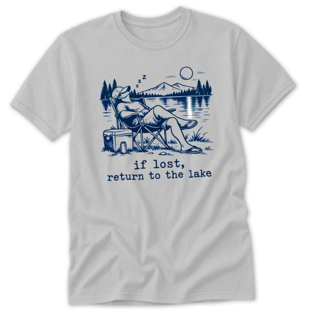 T-shirt graphic: person sleeping in a chair by a lake with text "if lost, return to the lake."