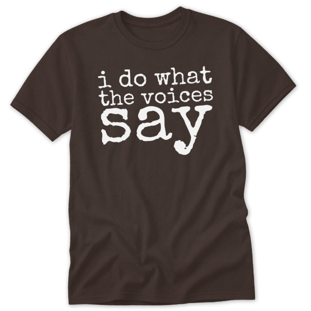 A dark brown short-sleeved t-shirt featuring the white distressed text i do what the voices say across the chest.