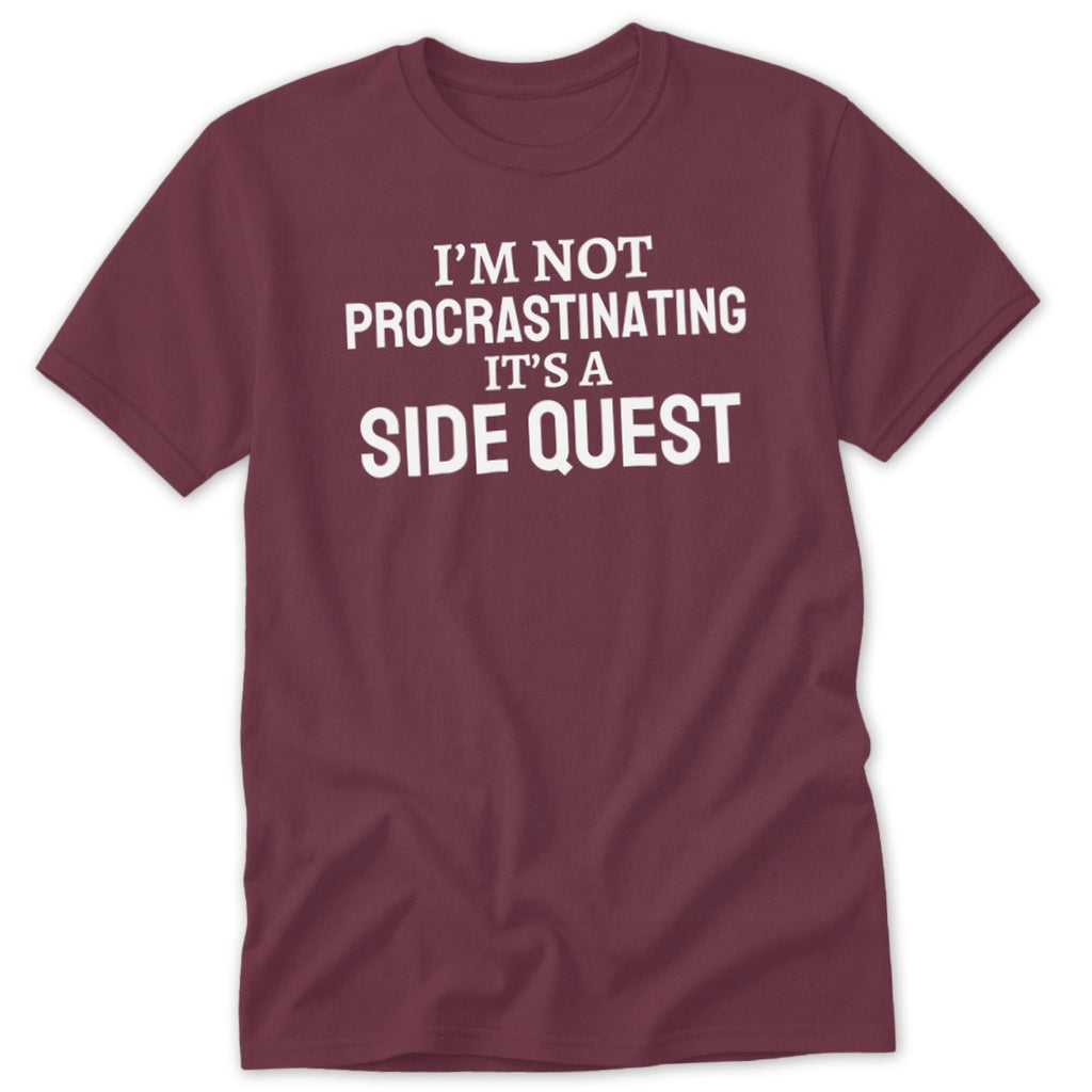 Maroon t-shirt with white text "I'm Not Procrastinating It's A Side Quest".