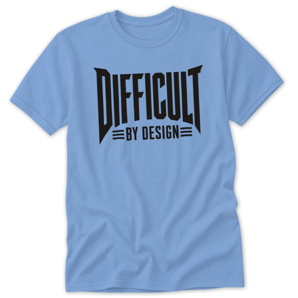 Light blue short-sleeve t-shirt with black text that reads "DIFFICULT BY DESIGN" centered on the chest.