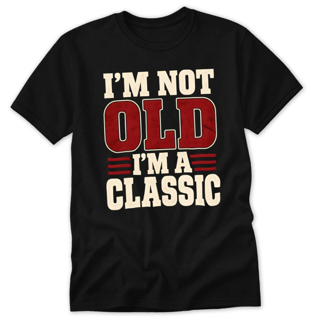 A black t-shirt printed with the text I'M NOT OLD I'M A CLASSIC in distressed white and red lettering.