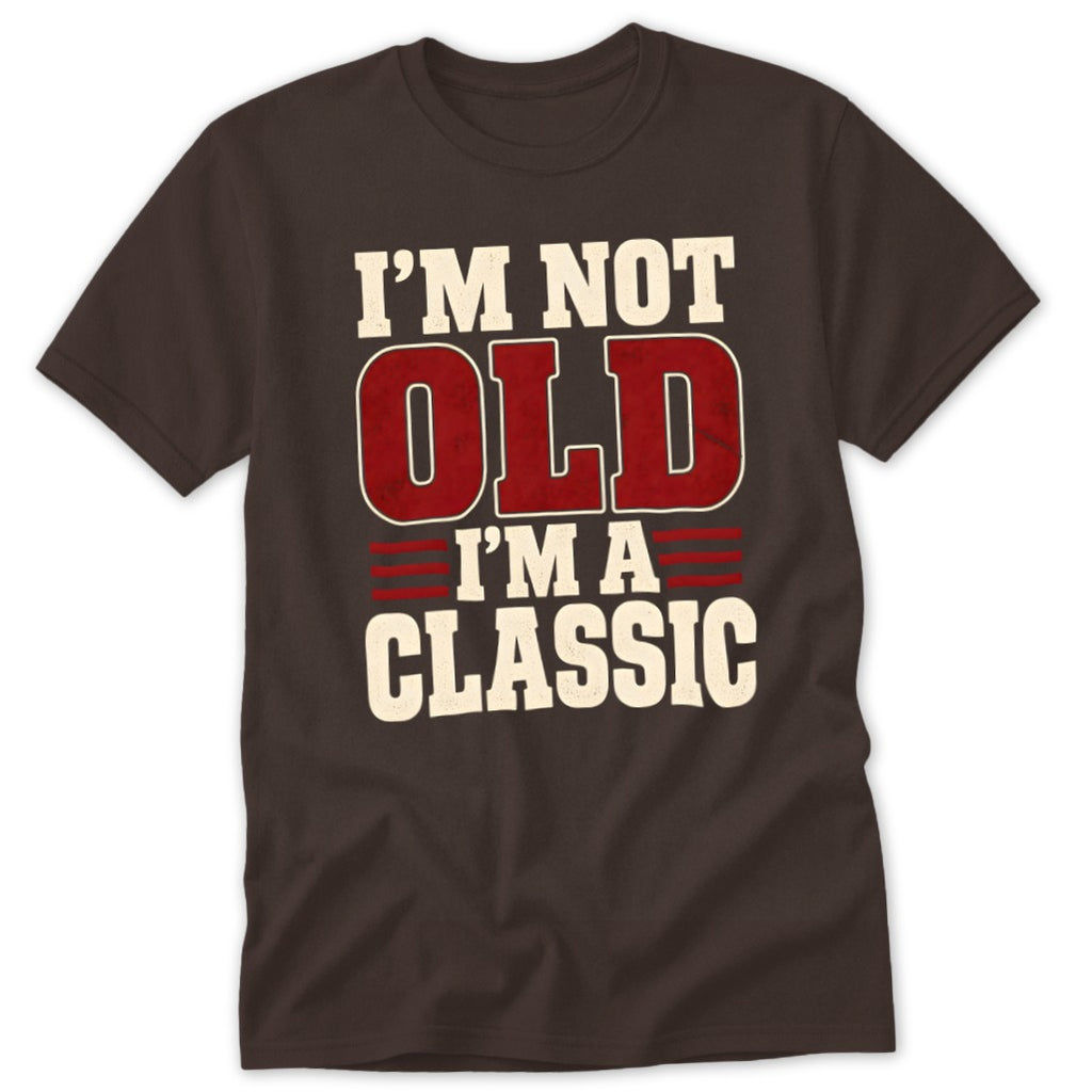 A dark brown short-sleeved t-shirt features white and red text that reads I'm Not Old I'm A Classic.