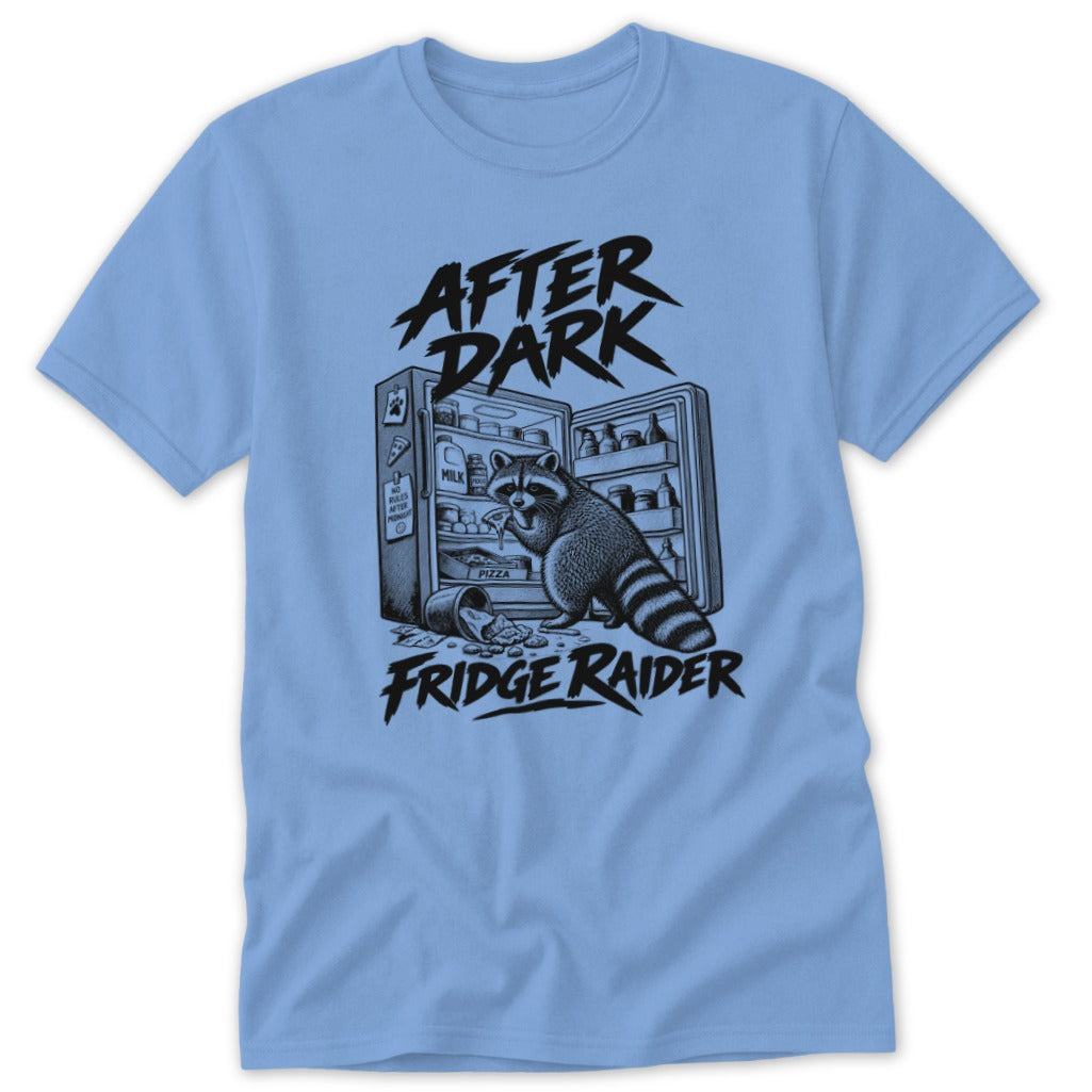 Light blue t-shirt with black graphic of a raccoon raiding a refrigerator, text "AFTER DARK FRIDGE RAIDER".