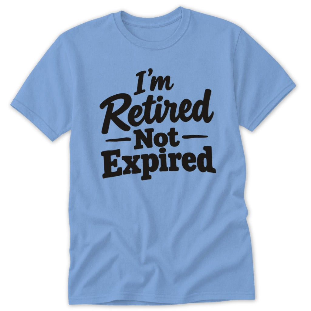 A light blue short-sleeved t-shirt featuring the black text I'm Retired Not Expired on the front.
