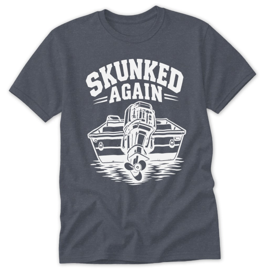 Graphic t-shirt with a boat and outboard motor design and the words "SKUNKED AGAIN".