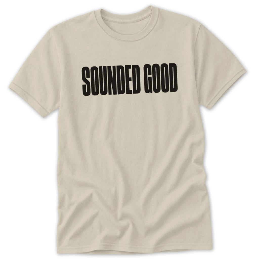 Beige t-shirt with "SOUNDED GOOD" text in bold black letters.