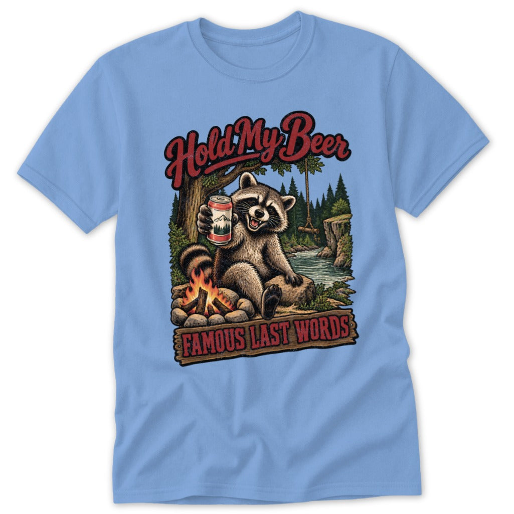 Raccoon holding beer can by campfire with text "Hold My Beer Famous Last Words".