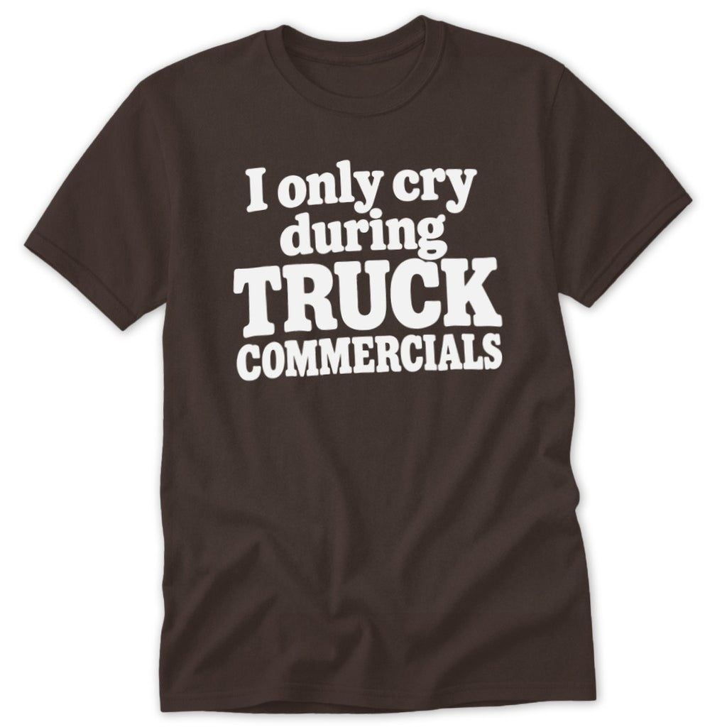 A brown short-sleeved crewneck t-shirt featuring the white text "I only cry during TRUCK COMMERCIALS" printed centrally on the chest.