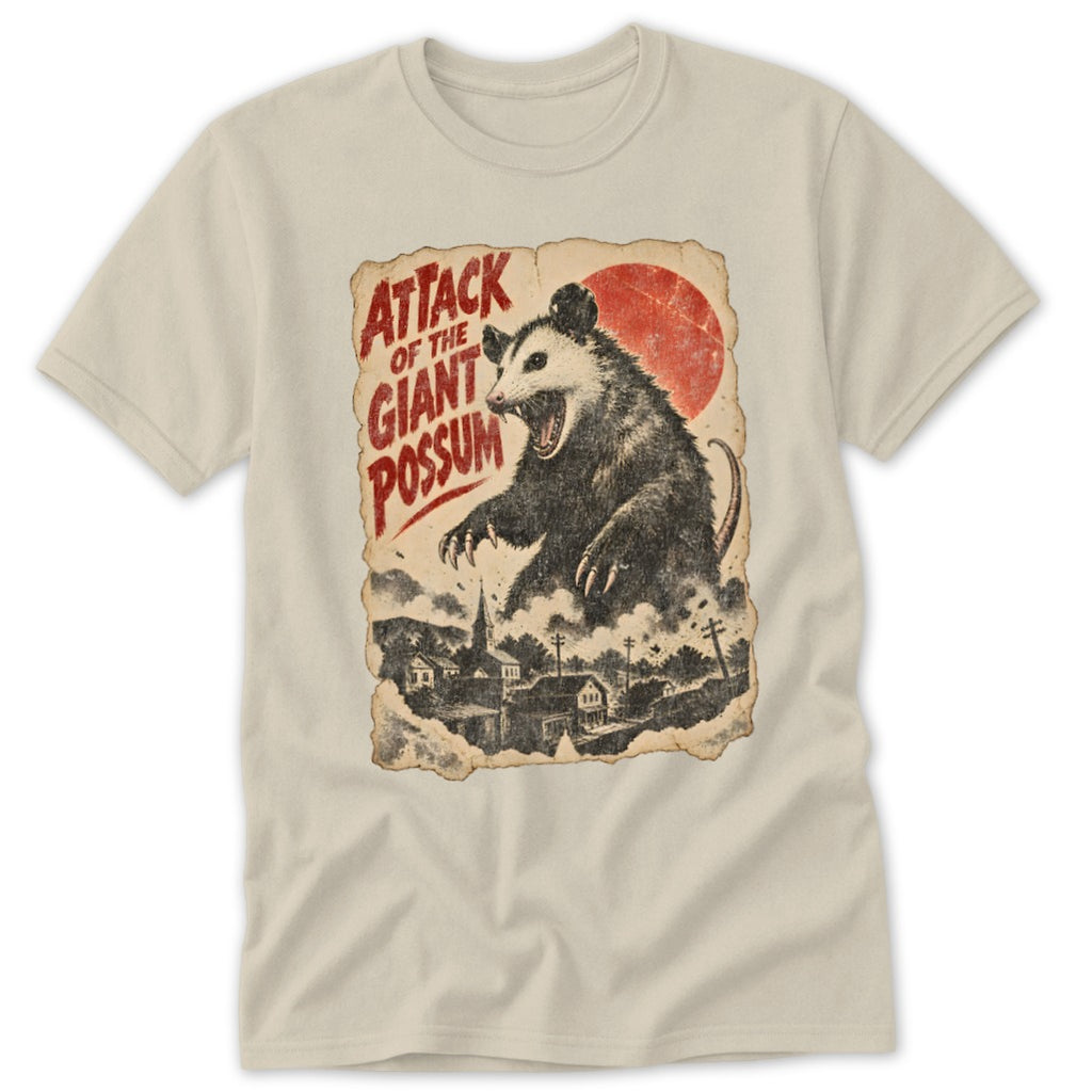 T-shirt with graphic: Giant possum attacking a town, reads "Attack of the Giant Possum".