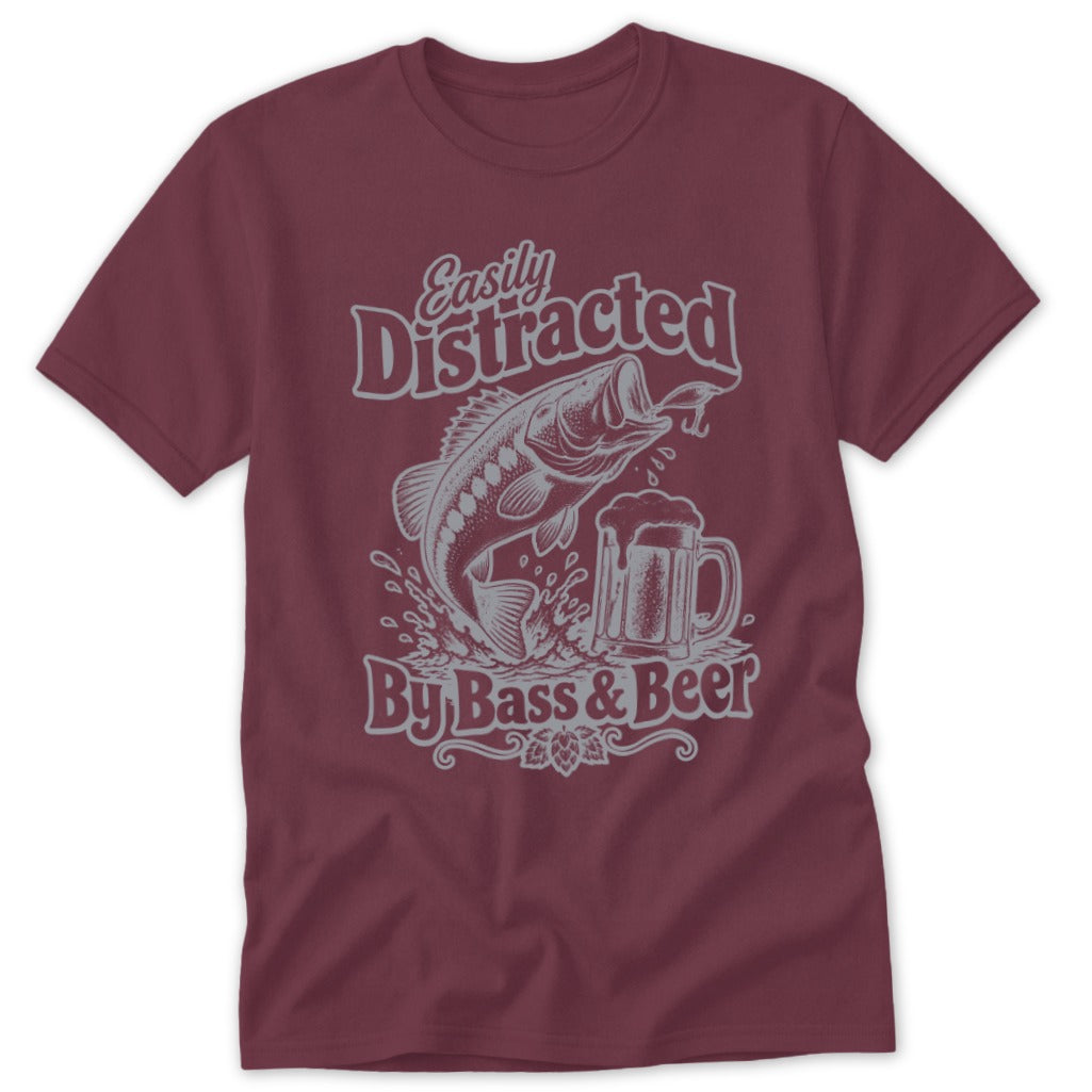Maroon short-sleeved t-shirt featuring a graphic of a leaping bass, a beer mug, and the text "Easily Distracted By Bass & Beer".