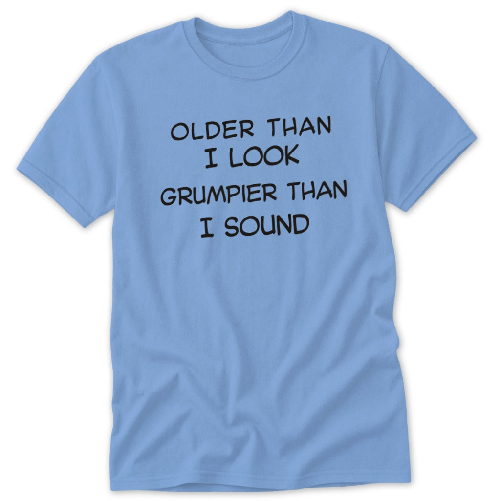 Light blue t-shirt with black text reading "Older than I look, grumpier than I sound."